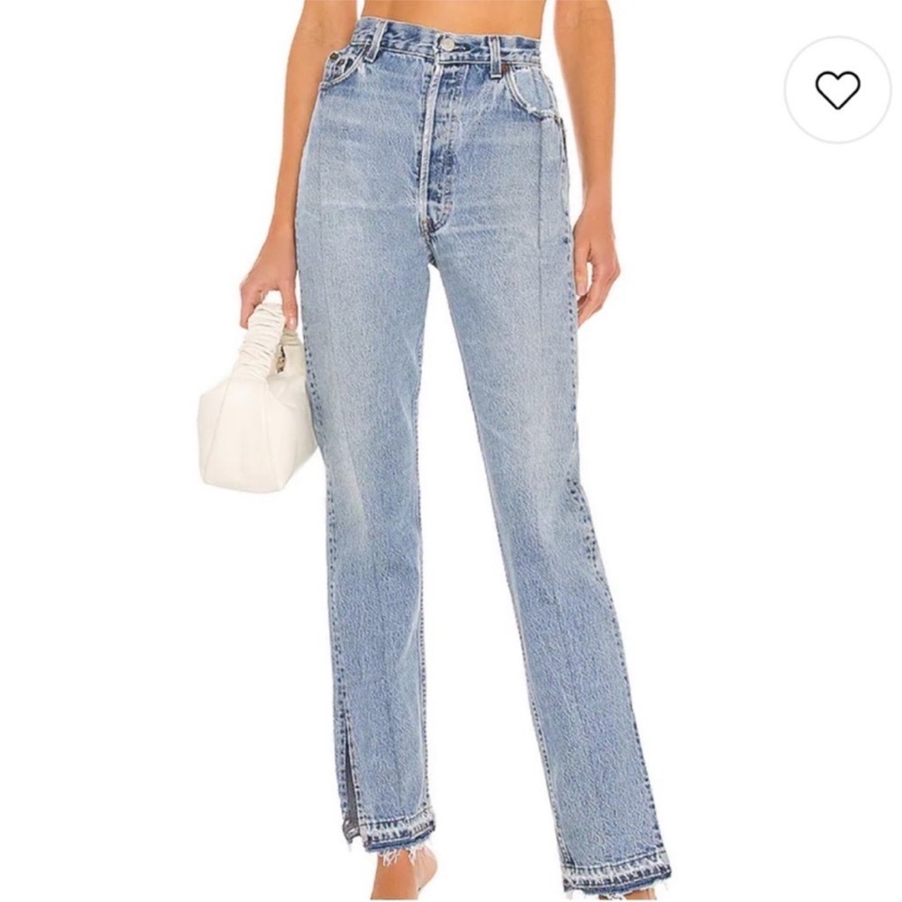 EB Denim “reinvented vintage Levi's 501s” frayed, split hemline